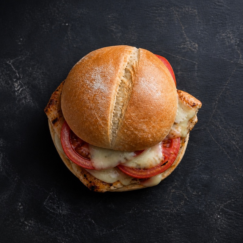 Step 3: Build the roll: oil, tomato, oregano, chicken.