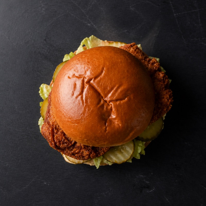 Step 3: Spicy yogurt on the buns, stack with lettuce and pickles.