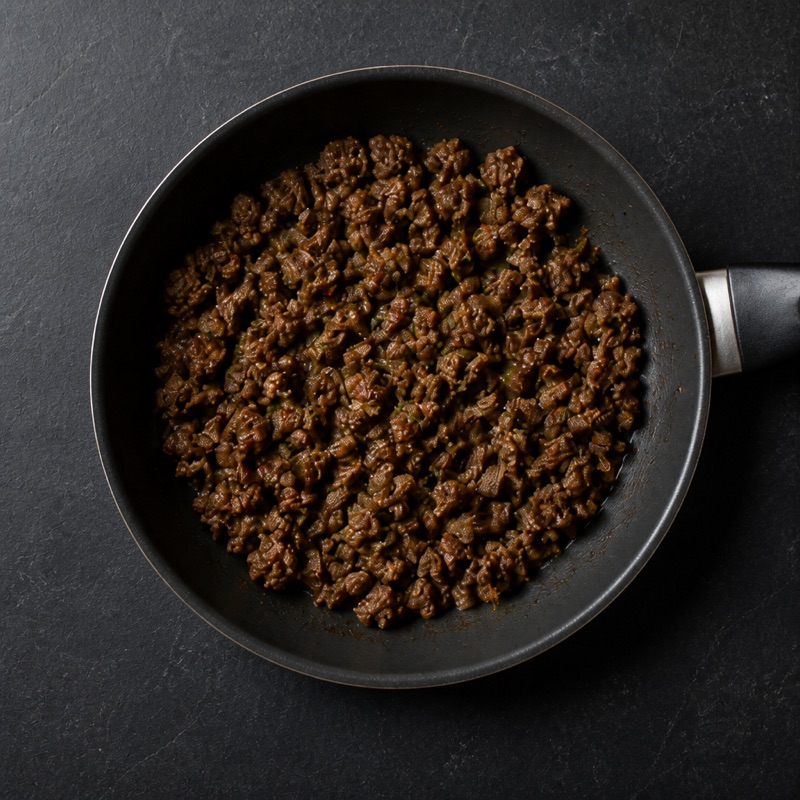 Step 2: Brown the beef with the spices.