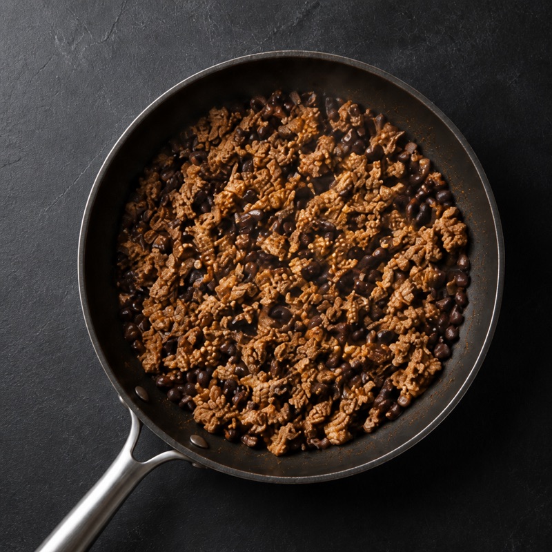 Step 1: Brown the turkey with the spices, stir in the beans.